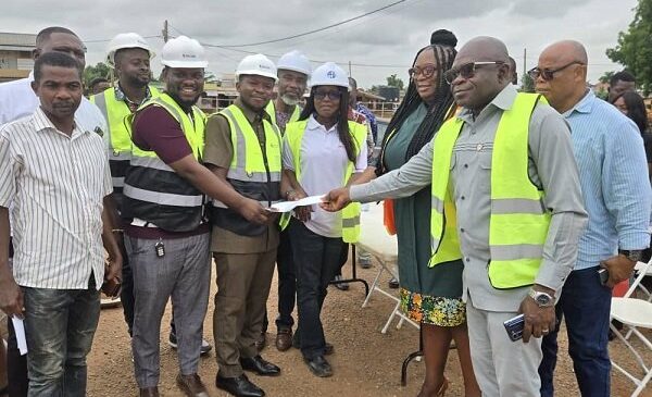 Adentan MCE hands over 24-hour economy market contract document
